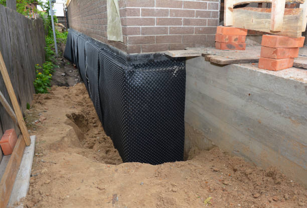 Happy homeowners after waterproofing job in Manassas